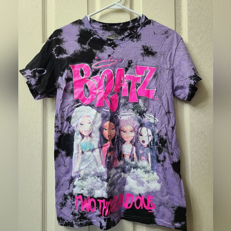 Nwt Brand New Rue21 Bratz Purple Black Tie Dye Tshirt Size Small Non Home; No Pets Once Clothing Is Photographed It Is Bagged In A Clear Bag, Marked With Reference Info And Number And The Bag Is Sealed With Decorative Masking Tape. It Is Kept Clean And Ready To Go When You Order! Bundle Multiple Items And Save Everything In My Store Is Packed With The Care I Would Want To See When I Order Something R012 Purple Grunge T-shirt With Letter Print, Purple Y2k Cotton T-shirt, Y2k Style Purple Graphic Print T-shirt, Purple Y2k Graphic Print T-shirt, Purple Y2k Style Graphic Print T-shirt, Purple Y2k Style Graphic T-shirt, Purple Grunge T-shirt For Summer, Purple Cotton Grunge T-shirt, Purple Crew Neck Grunge Top