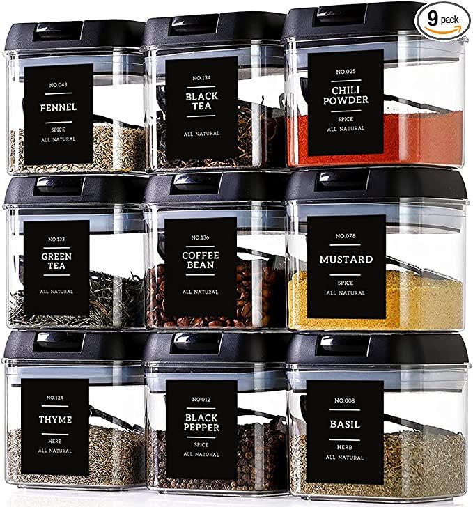 six clear containers filled with spices and seasoning on top of each other in front of a white background