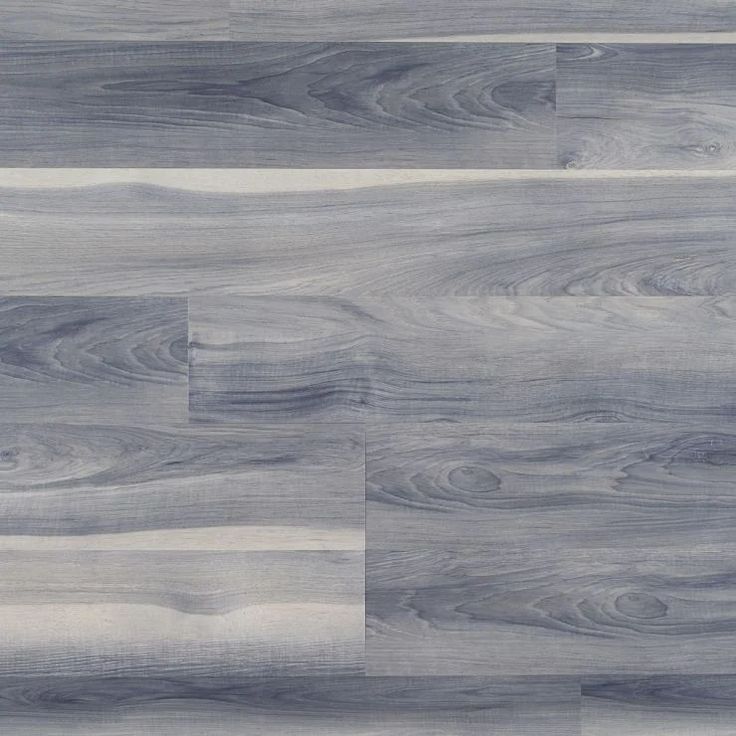 an image of wood flooring that looks like it has been painted in grey and white