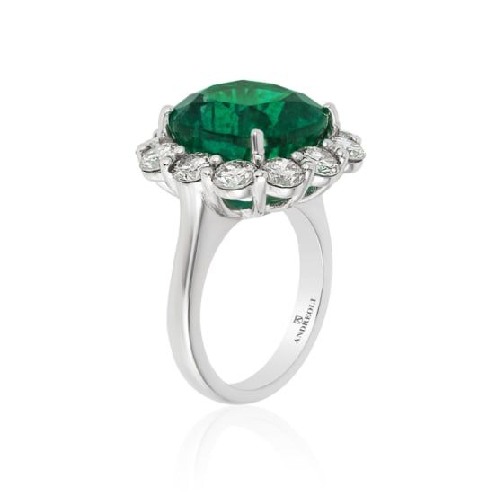 Andreoli Emerald And Diamond Ring features: 3.20ct Diamond 10.76ct Emerald Zambian Certified 17.66g Platinum Made In Italy Luxury Platinum Emerald Ring With Halo Design, Luxury Emerald Ring With Halo Design, Luxury Formal Emerald Ring With Halo Design, Emerald And Diamond Ring, To Miss, Diamond Ring, Platinum, Emerald, In Italy