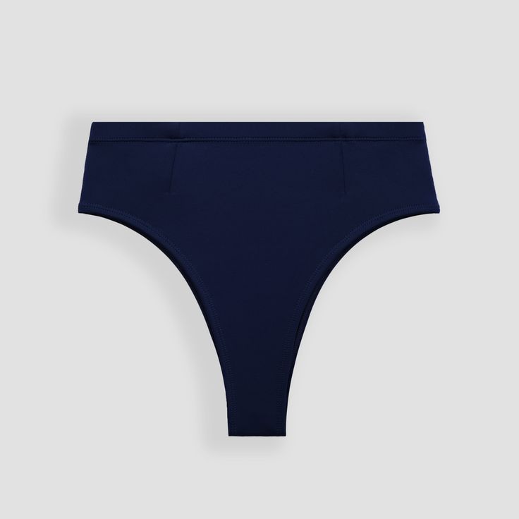 Ninefoot Studio Nyang-Nyang Surf Bikini Bottom in Navy Blue | Bottoms Blue Surfing Swimwear Briefs, Blue Brief Swimwear For Surfing, Navy Lined Swimwear For Pool, Blue Micro-elastic Smoothing Swimwear, Fitted Blue Swimwear With Smoothing Feature, Fitted Blue Smoothing Swimwear, Contoured Blue Swimwear For Swimming, Contoured Blue Swimwear, Micro-elastic Smoothing Blue Swimwear