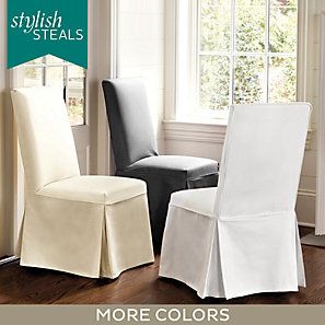 two white chairs and one black chair in front of a window with the words stylish