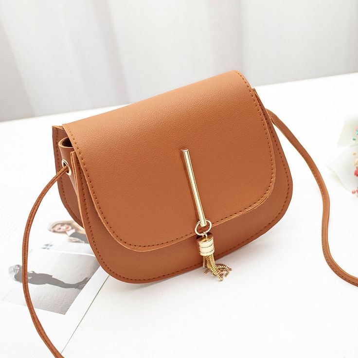 Brand Name: NIGEDULining Material: Synthetic LeatherMain Material: PUShape: FLAPPlace Of Origin: GUANG DONG ProvinceOrigin: CN(Origin)Decoration: TASSELHardness: SoftGender: WOMENStyle: CasualPattern Type: SolidOccasion: VersatileInterior: Cell Phone PocketExterior: NONEModel Number: bags for women bb103Closure Type: COVERColor: Black, brown, red, Pink,Gray,WhiteSize: 18X13X8cm (Length x Height x Width)bag 1: ladies hand bagsbag 2: crossbody bags for womenbag 3: women messenger bagsbag 4: small Crossbody Saddle Bag, Women Crossbody Bag, Tassels Fashion, Round Bag, Tassel Bag, Satchel Purse, Shoulder Messenger Bag, Leather Messenger, Women Bag