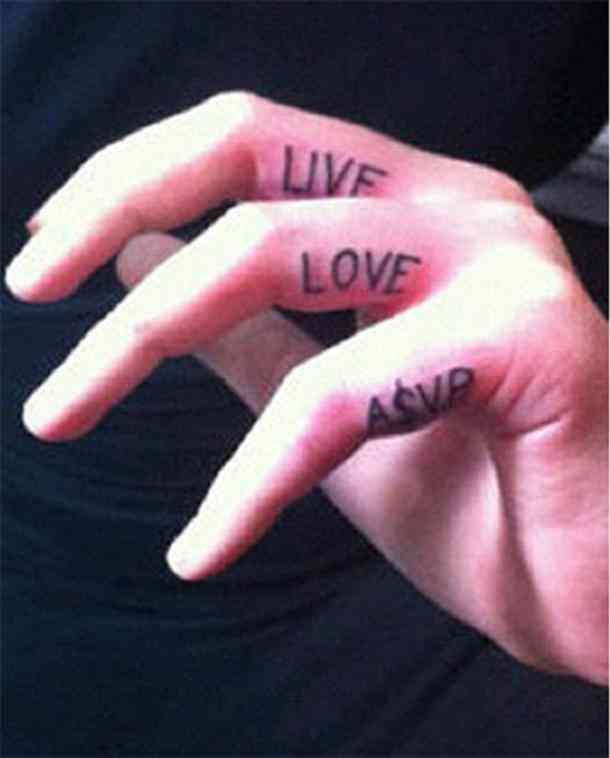 two fingers with the words live love and avd written on them, in black ink