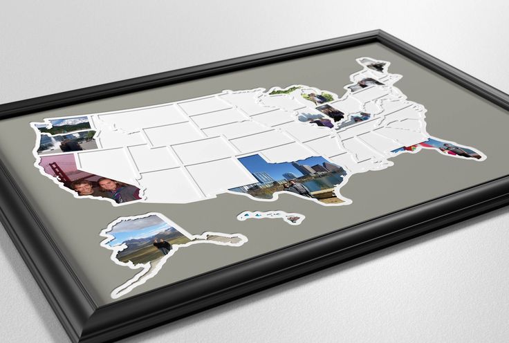 a black frame with some pictures cut out of the shape of the united states on it