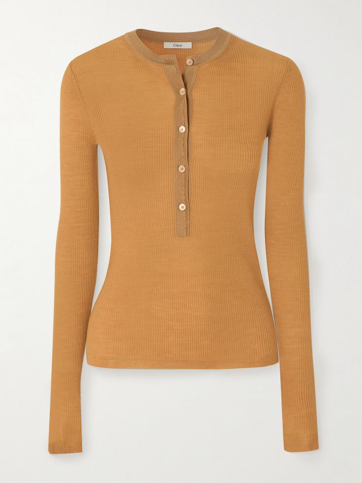 Chloé's sweater is so timeless, you'll still be reaching for it in seasons to come. It's cut from soft ribbed wool and topped with a classic Henley collar. Complement the versatile shade with other warm neutrals. Elegant Ribbed Merino Wool Tops, Workwear Ribbed Merino Wool Tops, Merino Wool Ribbed Tops For Work, Ribbed Merino Wool Tops For Work, Chic Merino Wool Tops With Ribbed Cuffs, Chic Merino Wool Top With Ribbed Cuffs, Classic Ribbed Merino Wool Top, Wool Ribbed Tops For Workwear, Ribbed Merino Wool Top For Fall