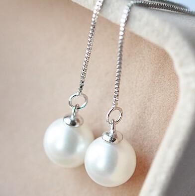 Edgy and classy. These beautiful earrings feature a simulated pearl floating on a very fine box chain thread. The earrings can be adjusted to fit any length you desire. Such a unique, interesting look! Material: Simulated Pearl. Silver plated. Size: 9mm . Thread chain is 4 inches. Comes in a gift box. (Reg $25.99) Thread Chains, Thread Earrings, Silver Box, Silver Pearls, Box Chain, Long Earrings, Long Necklace, Beautiful Earrings, Women's Earrings