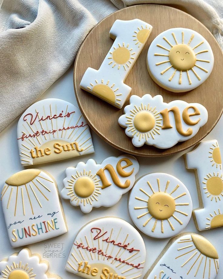 decorated cookies with the words one and sun on them