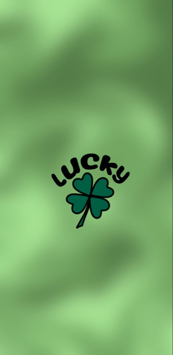 the lucky luck shamrock is in green with black letters and a four leaf clover on it's left side