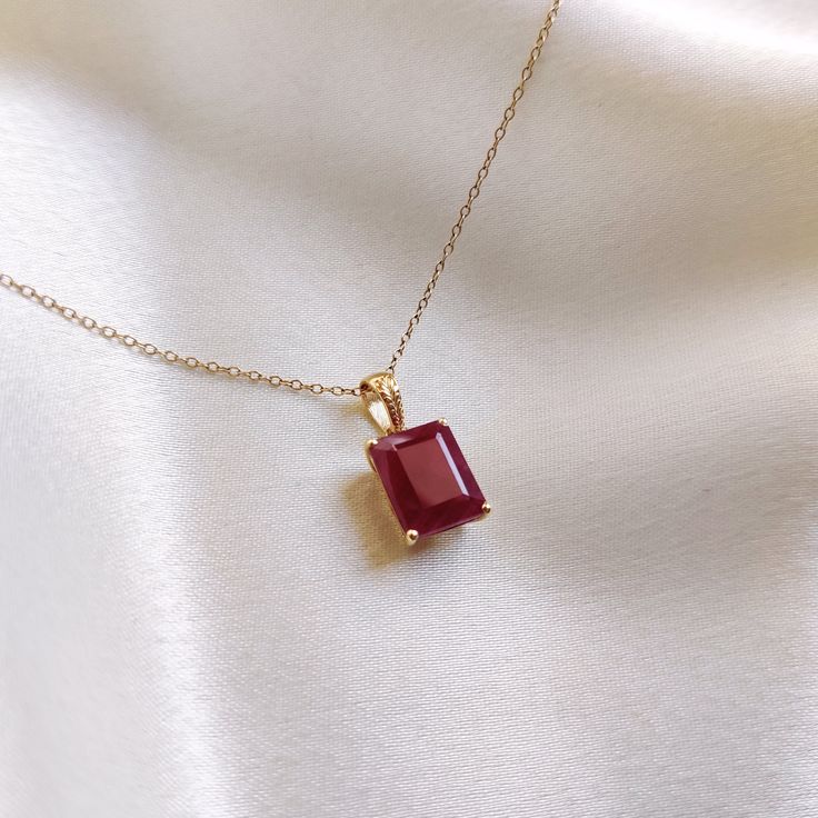 This stunning pendant is set in 14K Solid Yellow Gold with Natural Ruby with utmost precision. It is an unique gemstone pendant for nearly every occasion and is completely hassle-free jewelry. ITEM DETAILS * Gem: Ruby * Gem Size: 8X10 mm * Gem Shape: Octagon * Gem Weight: 4.25 carats * Gold Purity: 14KT  * Gold Weight: 0.61 gram * Total Weight of the Pendant: 1.46 gram The Gold purity is guaranteed and it comes with authentic 14KT gold hallmark. Since my items are handmade, they are absolutely nickel and lead free. CUSTOMIZATION * Gemstone customization is available and it can be substituted with a gem of your choice. Kindly message me for the same. PACKAGING * The Pendant comes with layers of safe and secure wrapping along with Free handmade jewelry box with every purchase. ➡️Head to thes Ruby Gemstones For Gifts In Fine Jewelry Style, Ruby Gemstones As Fine Jewelry Gift, Fine Ruby Gemstones For Gifts, Fine Ruby Gemstones As A Gift, 14k Gold Necklace With Rectangular Stone For Gifts, Ruby Birthstone Gemstone For Gifts, Ruby Birthstone Gemstones As Gifts, Rose Gold Jewelry With Rectangular Stone For Gift, Ruby Necklace With Bezel Setting As Gift