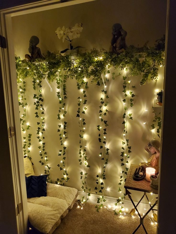 the room is decorated with lights and ivy vines on the wall, along with other decorations