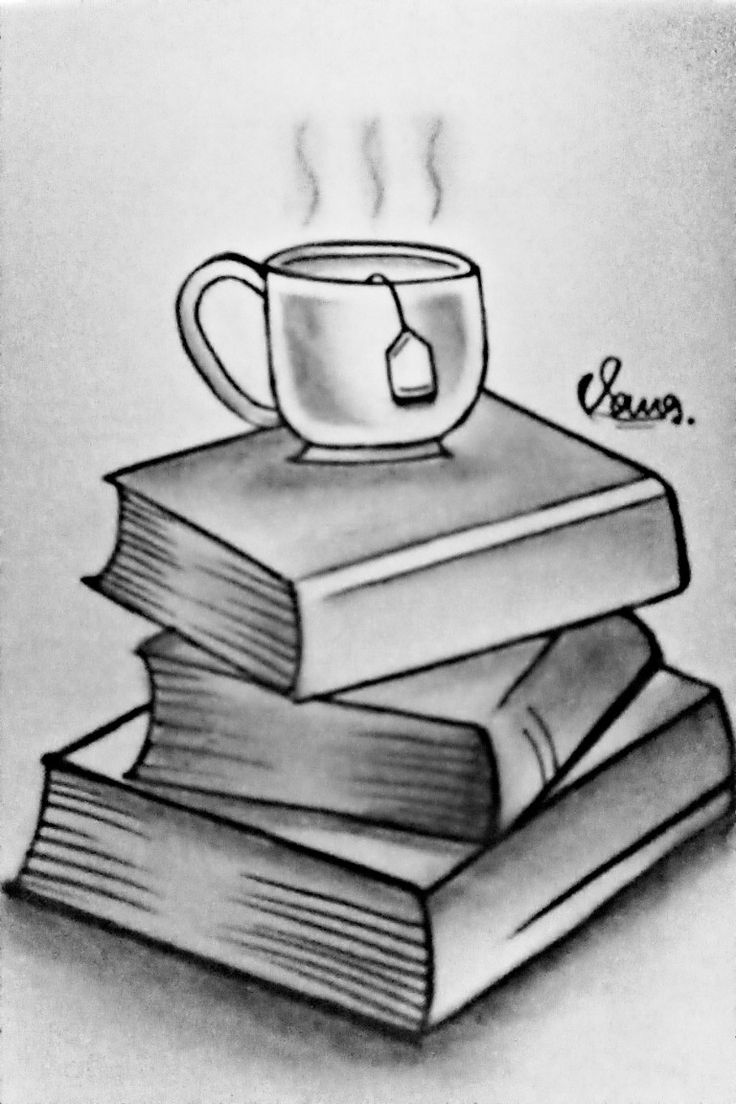 a stack of books with a coffee mug on top