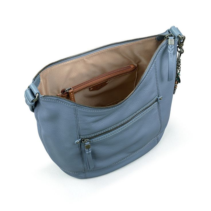 Round out your handbag lineup with Sequoia, our top-rated, must-have hobo. Crafted from soft, sustainably-sourced pebbled leather and finished with recycled trims and lining, this perfectly proportioned style is kitted with plenty of pockets and has more than enough room for your everyday essentials. Bonus: your new go-to bag arrives with a detachable keychain garnished with our signature charms. Casual Textured Leather Hobo Bag For On-the-go, Casual Leather-lined Shoulder Hobo Bag, Casual Textured Leather Hobo Bag, Casual Hobo Bag With Leather Lining For Travel, Casual Travel Hobo Bag With Leather Lining, Casual Hobo Bag For Travel With Leather Lining, Versatile Textured Leather Hobo Bag, Casual Leather-lined Crossbody Hobo Bag, Travel Shoulder Bag In Textured Recycled Leather