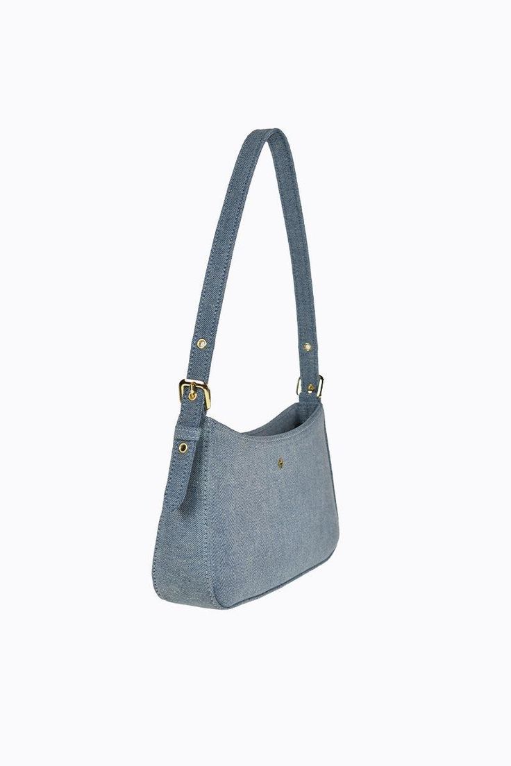 Meet Lilu, where classic chic meets everyday elegance. This bag isn't just an accessory, it's a statement. Trendy Denim Shoulder Bag For Daily Use, Trendy Denim Shoulder Bag With Double Handle, Trendy Denim Blue Shoulder Bag For Daily Use, Trendy Denim Blue Satchel Bag, Trendy Denim Blue Shoulder Bag With Double Handle, Trendy Rectangular Denim Blue Shoulder Bag, Everyday Denim Satchel Bag, Trendy Denim Blue Bag With Adjustable Strap, Everyday Canvas Baguette Shoulder Bag