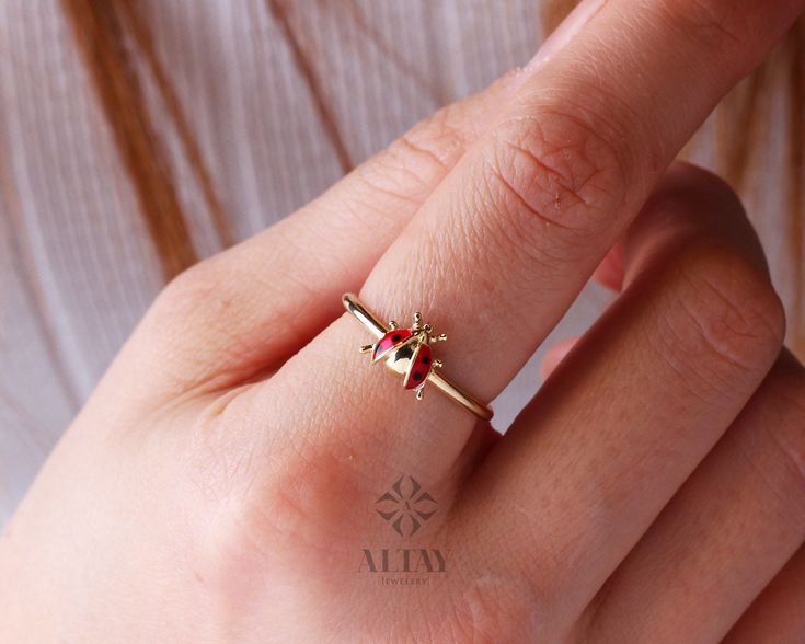 ABOUT PRODUCT This 14K Gold Ladybug Ring is suitable gift for girlfriend, mom and her. You can even buy as a birthday gift for your friends or anniversary gifts, If you want to add a special note we can write for you and put to inside of package. We manufacture our jewelry pieces with carefully and after production we double checking in quality control department. Our main idea is keep our items for daily wearing especially for minimalist jewelry pieces. 14K Gold Ladybug Ring, Ladybird Ring, Cut Enamel Yellow Gold Rings For Gift, Handmade Yellow Gold Enamel Ring Gift, Yellow Gold Enamel Rings For Gifts, Red Enamel Ring Fine Jewelry As Gift, Red Enamel Ring Fine Jewelry For Gift, Red Enamel Ring In Fine Jewelry Style As Gift, Red Enamel Fine Jewelry Ring As Gift, Fine Jewelry Yellow Gold Enamel Ring Gift, Yellow Gold Enamel Ring For Gift