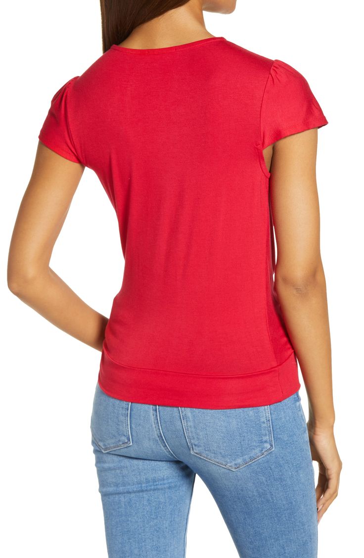 A faux-wrap front flatters on this soft and versatile jersey top cinched with a saucy tie at the hip. 23 1/2" length Surplice V-neck Short sleeves 95% rayon, 5% spandex Machine wash, dry flat Imported Women's Clothing Stretch Rayon V-neck Top, Fitted V-neck Rayon Top, Solid Color V-neck Faux Wrap Top, Stretch V-neck Top With Twist Front, Stretch V-neck Twist Front Top, Fitted Solid Color Top With Twist Front, Stretch Twist Front V-neck Top, Fitted Twist Front Top, Spring Stretch Faux Wrap Tops