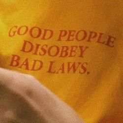 a banana with the words good people disobey bad laws on it's side