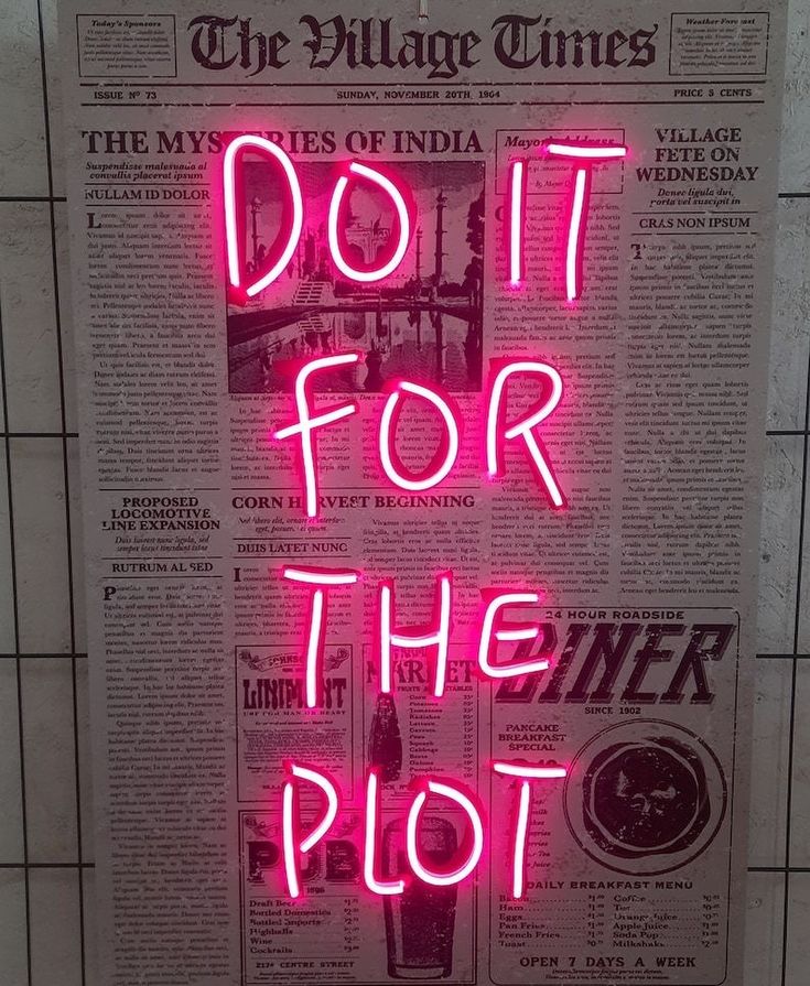 a pink neon sign that reads do it for the plot in front of a newspaper