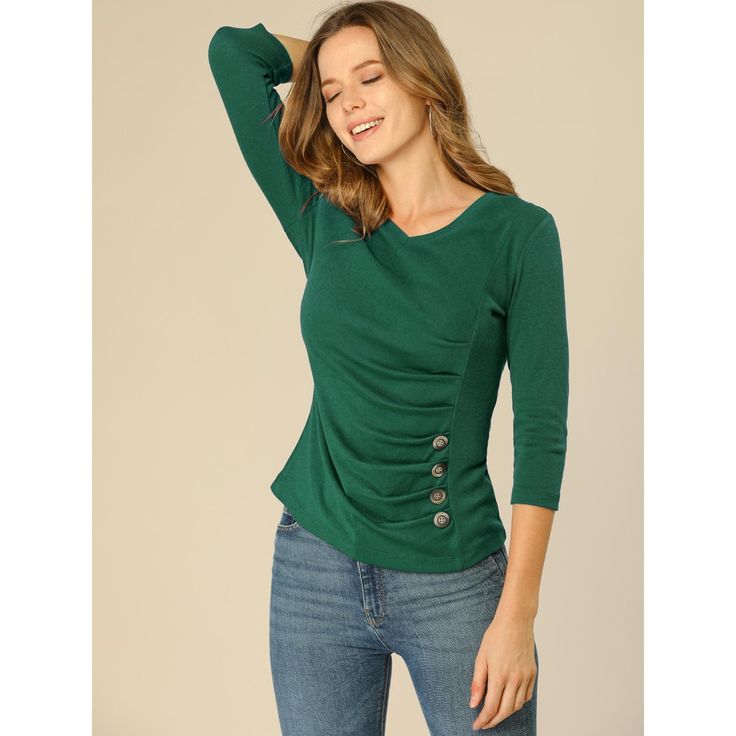 This button-decor blouse gives office chic a whole new meaning. Simple and elegant, this blouse is an ideal option for your next workday. This casual blouse will be a favorite piece in your loungewear wardrobe. This piece is designed to be versatile, and perfect for work, holidays, and everywhere in between. Perfect to wear with leggings or jeans and pair it with your favorite boots. Green 3/4 Sleeve Top For Work, Green Buttoned Tops For Business Casual, Green Business Casual Tops With Buttons, Elegant Top With 3/4 Sleeves And Button Closure, Elegant 3/4 Sleeve Top With Button Closure, Green Top With 3/4 Sleeves And Button Closure, Loungewear Wardrobe, Ruched Blouse, Button Decor