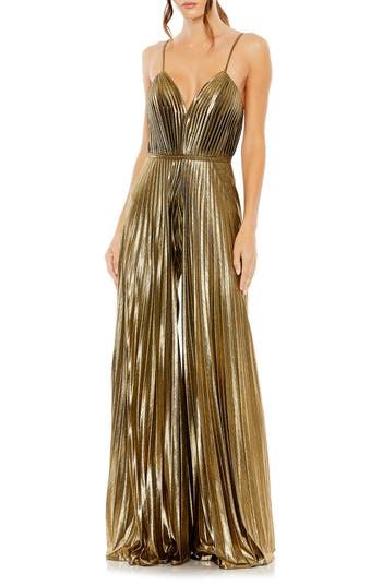 Enter your next special event in a disco-chic manner with this crisp, accordion-pleated jumpsuit styled with flowy wide legs, slender straps and a banded waist. 61" length; 31 1/2" inseam; 136" leg opening (size 8) Plunge neck Spaghetti straps Partially lined 100% polyester Spot clean Imported Asian Owned/Founded Pleated Jumpsuit, Formal Jumpsuit, Mac Duggal, Metallic Fabric, Jumpsuit Fashion, Sleeveless Jumpsuits, Gold Dress, Fashion Fabric, Wide Leg Jumpsuit