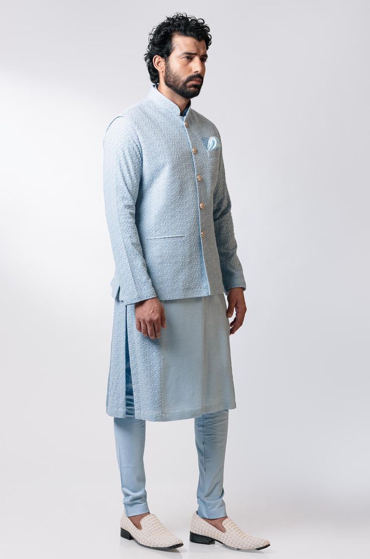 Editor's Note This set features a Side Paneled Embroidered Kurta Set With Embroidered Nehru Jacket Fabric: Chanderi Silk, Cotton Satin Lycra Color: Blue Care: Dry Clean Only Customize Your Outfit Can't find the size you're looking for? No stress. Just select size "Custom" while adding the item to your cart. We will follow up with you for your body measurements. To request a color or design customizations, please contact our customer care by using our "Ask us a question" form or simply email us. Cotton Long Sleeve Bandhgala With Zari Work, Cotton Bandhgala With Zari Work And Long Sleeves, Cotton Bandhgala With Resham Embroidery Long Sleeve, Cotton Nehru Jacket With Long Sleeves For Wedding, Cotton Long Sleeve Nehru Jacket For Weddings, Long Sleeve Cotton Nehru Jacket For Wedding, Embroidered Cotton Nehru Jacket For Formal Occasions, Formal Embroidered Cotton Nehru Jacket, Blue Cotton Nehru Jacket With Resham Embroidery