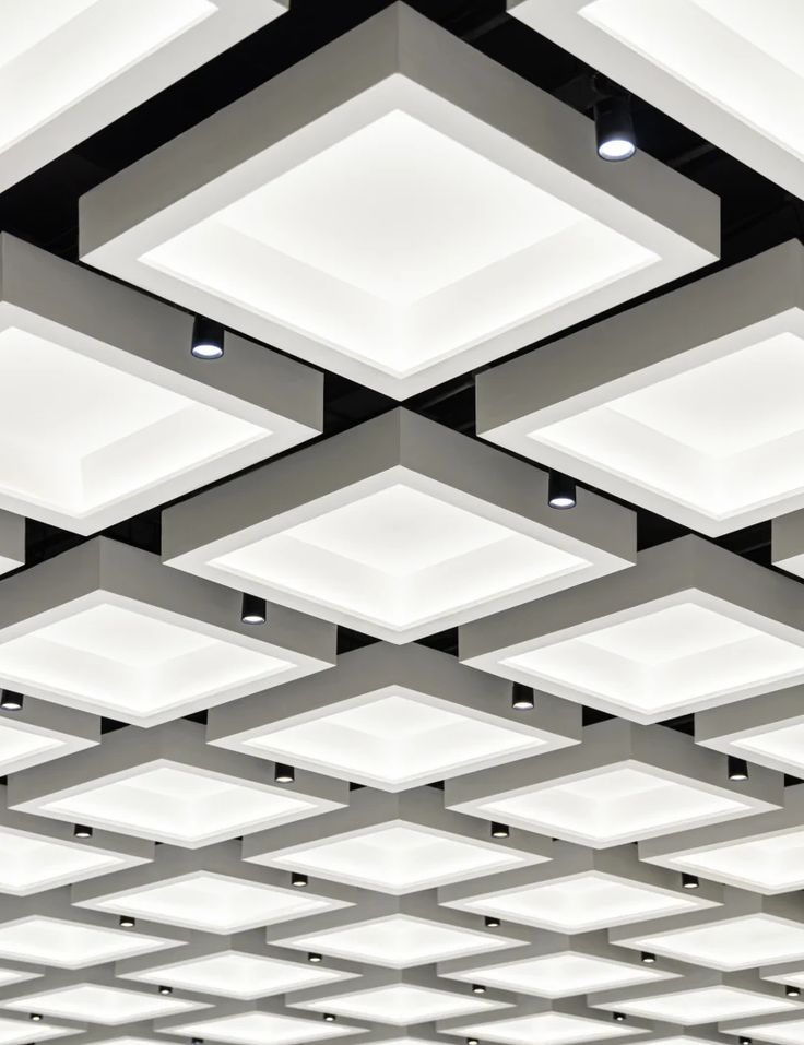 the ceiling has many square lights on it