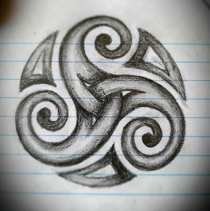 a drawing of a swirly design on lined paper