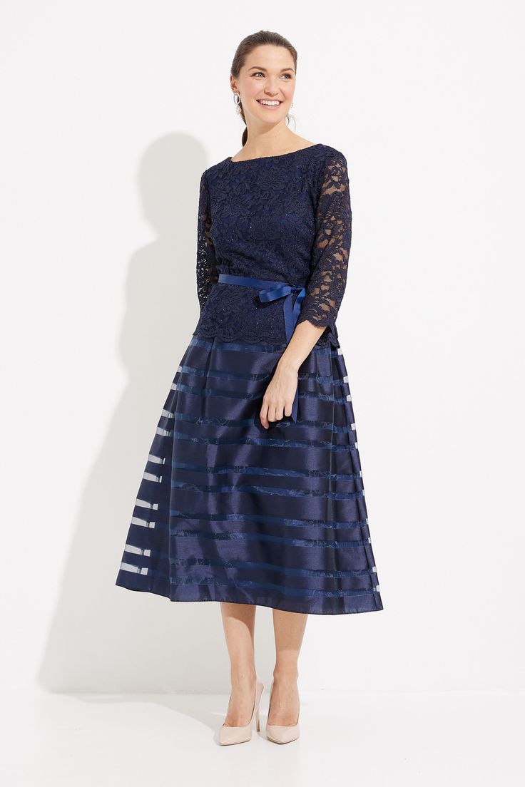 A remarkable dress for your next cocktail event or soirée, this distinguished design from Alex Evenings has all the makings of an instant classic. Navy Elegant Taffeta Spring Dress, Elegant Spring Taffeta Dress, Flowy A-line Dress With Lined Skirt, Formal Tea-length Dress With Pleated Bodice, Formal Taffeta Midi Dress With Fitted Bodice, Elegant Fitted Taffeta Midi Dress, Spring Formal Taffeta Evening Dress, Taffeta A-line Dress For Gala, Fitted Nylon Cocktail Dress