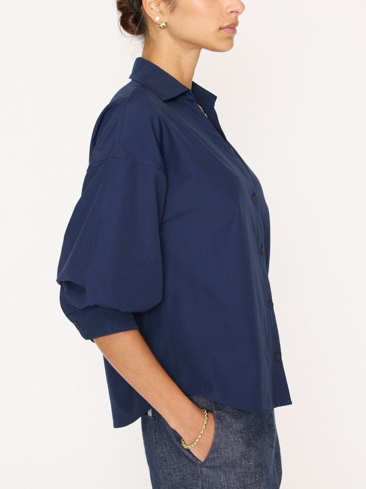 Runs true to size Relaxed fit, take a size down if you prefer a closer fit Collared v-neckline Button front Elbow length sleeves with a blouson (pushed-up) effect Button cuff Scooped, shirttail hem 65% Polyester/35% Cotton Imported Model is 5'9" and is wearing a size Small Inspired by our most-loved Kate Belted Shirtdress, our Kate Shirt has that same easy sensibility that will make you gravitate towards it day in and day out. This perfect shirt can be worn tucked in or loose and relaxed for tho It Day, Stylish Clothes For Women, Easy Breezy, Elbow Length Sleeve, Ulla Johnson, Perfect Shirt, Cuff Sleeves, Stylish Women, Denim Dress