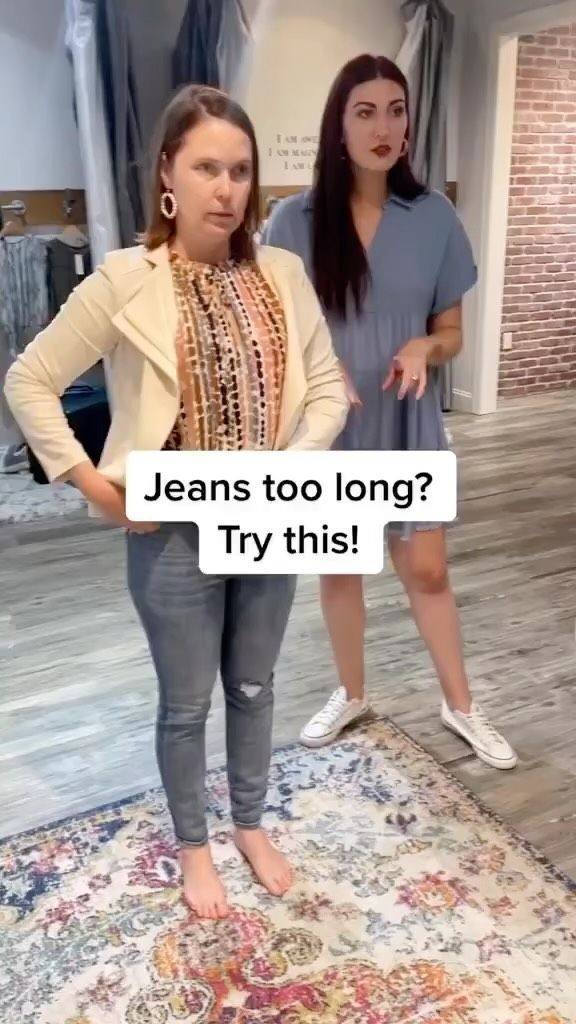 two women standing in front of a rug with the caption jeans too long? try this