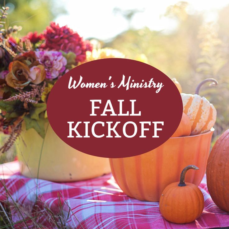 women's university fall kickoff with pumpkins and flowers in the back ground