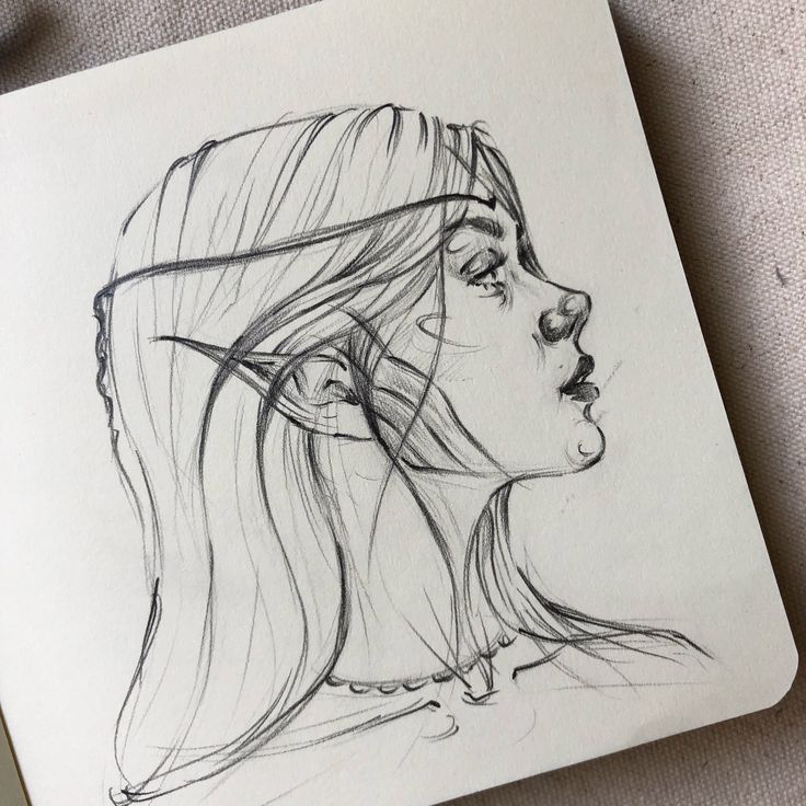 a pencil drawing of a woman's profile