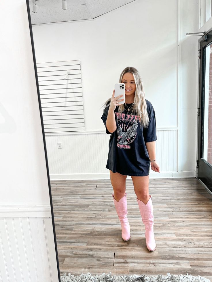 Oversized Graphic Tee & Pink Cowgirl Boots 💖 Oversized Shirt With Cowboy Boots, Oversized Tshirt Cowgirl Boots, Tshirt Dress Cowboy Boots Outfit, Light Pink Cowboy Boots Outfit, Oversized Tshirt With Cowboy Boots, Festival Cowboy Boots, Pink Western Boots Outfit, Pink Cowgirl Boots Outfit, Pink Cowboy Boots Outfit