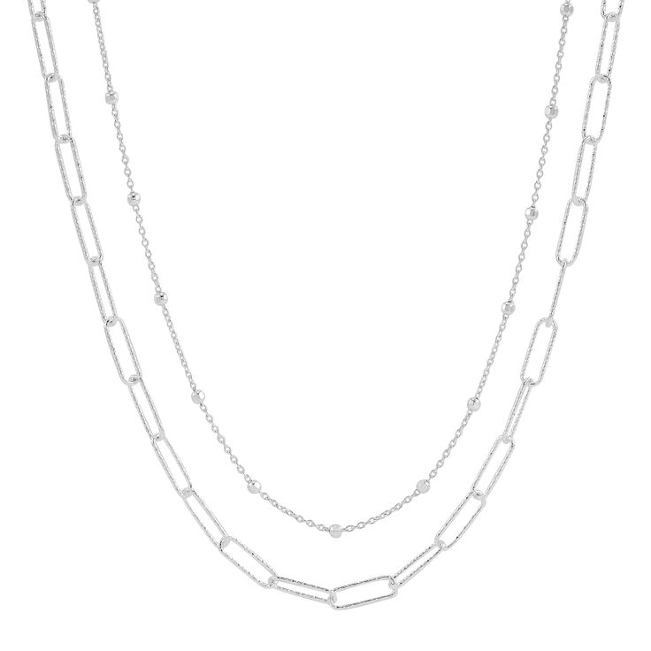 Sometimes, opposites really do attract! Case in point, this double-strand necklace makes one chic piece. It features a silver paperclip chain and a beaded station chain. Its high contrast works best with simpler tops and dresses. The piece comes with a “.925” sterling silver quality stamp as a symbol of guaranteed product quality. Made in Italy. Silver Formal Paperclip Chain Necklace, Elegant Silver Necklace With Paperclip Chain, Classic Paperclip Silver Chain Necklace, Elegant Silver Dual-tone Necklaces, Silver Double Chain Multi-strand Necklace, Contrast Words, Double Strand Necklace, Opposites Attract, Sterling Necklaces