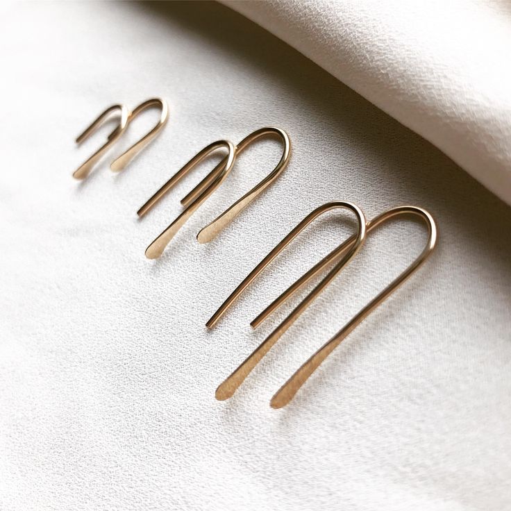 "QUILL THREADER EARRINGS Minimal, arc threaders. Available in sterling silver and 14k gold-fill. Choose from small (drops 7/16\"), medium (drops 11/16\"), and large (drops 15/16\"). *Medium is our most popular size! Can't decide which size to order? We also offer sets of three, which include one small, one medium, and one large, in either sterling silver or gold-filled. Every piece of In Situ Jewelry is thoughtfully designed and handmade in our studio in coastal California. \"Exactly what I was Quill Earrings, Herkimer Diamond Earrings, Cheap Earrings, Minimal Earrings, Threader Earrings, Everyday Earrings, Wire Earrings, Dainty Earrings, Jewelry Inspo