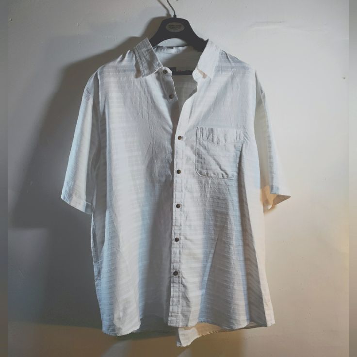 Causal Comfortable Button Up Button-up Short Sleeve Beach Shirt, Button-up Vacation Shirt, Casual Collar Shirt With Button Closure And Relaxed Fit, Relaxed Fit Collared Shirt With Buttons, Vacation Button-up Shirt, Collared Shirt With Buttons In Relaxed Fit, Casual Shirt With Buttoned Pockets And Casual Collar, Relaxed Fit Shirt With Buttons For Vacation, Casual Collared Shirt With Buttons