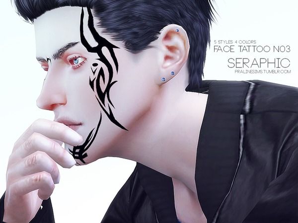 a man with black hair and tattoos on his face