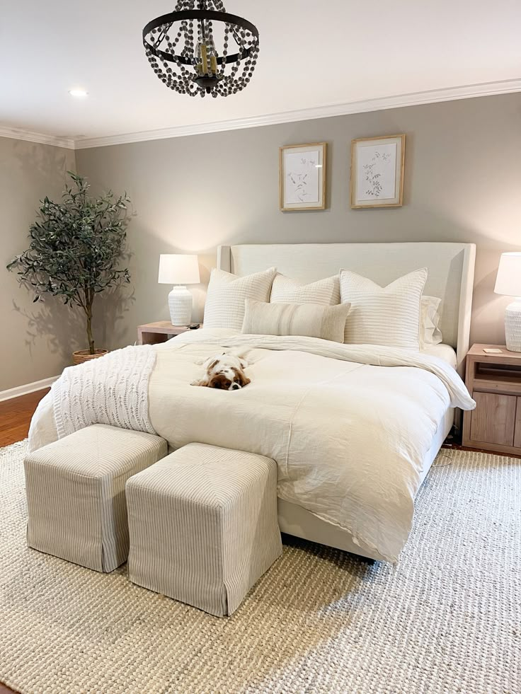 a large bed sitting in a bedroom on top of a rug