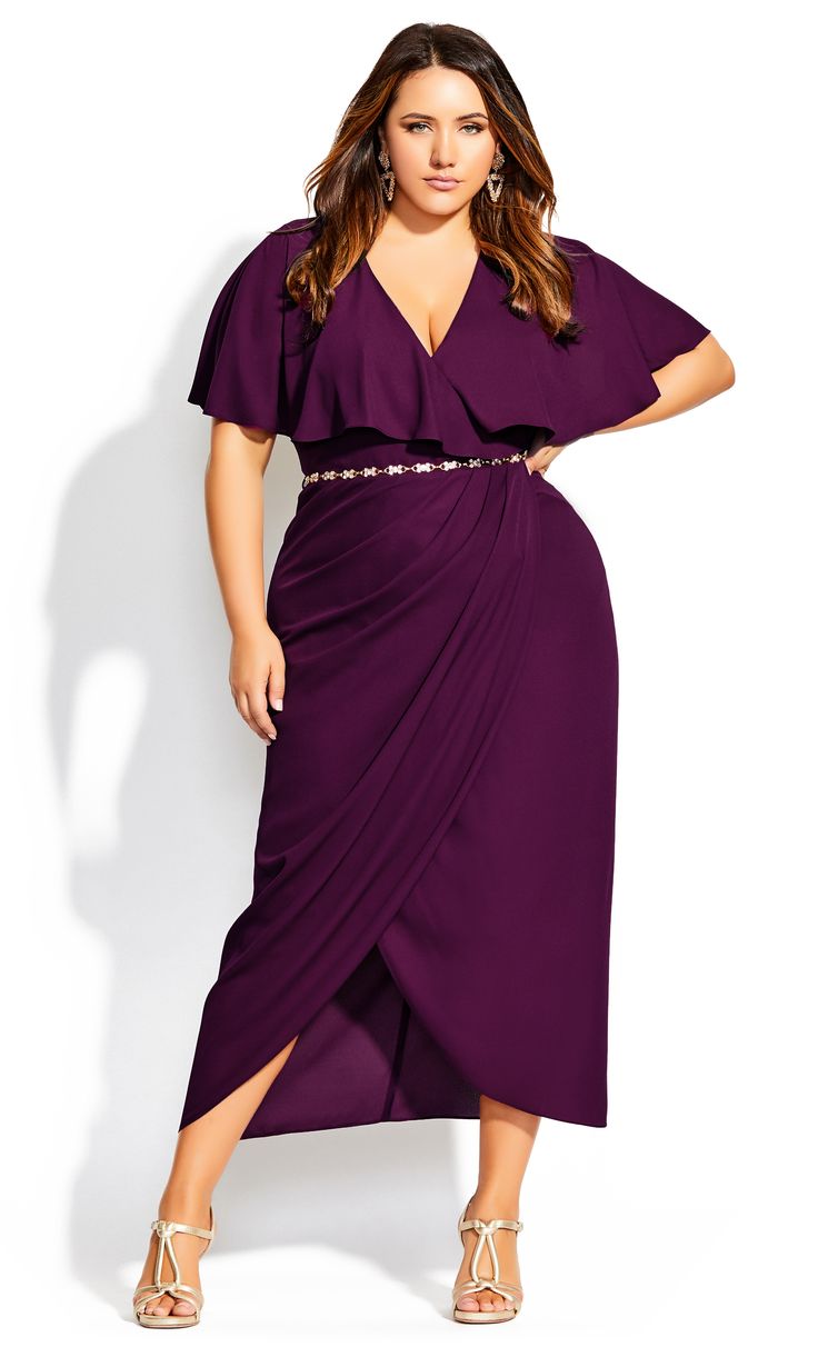 Cast a spell of seduction with your curves in the ultra-divine Enchantment Maxi Dress. Draping across your curves in a cape style V-neckline, faux wrap fit, and jeweled chain belt accent, this luxe dress is ready to stun. Key Features Include: - Faux wrap V-neckline - Cape style yoke & sleeve coverage - Pleated bodice detail - Fitted waistline - Removable gold jewel chain belt - Faux wrap maxi length skirt - Invisible back zip closure - Woven non-stretch fabrication - Satin lined - Keyhole back Plus Size Formal Wedding Guest Dress, Bedazzled Belt, Trendy Plus Size Fashion, Plus Size Cocktail Dresses, Cape Style, Wrap Maxi Skirt, Cape Sleeves, Plus Size Maxi, Mini Shift Dress