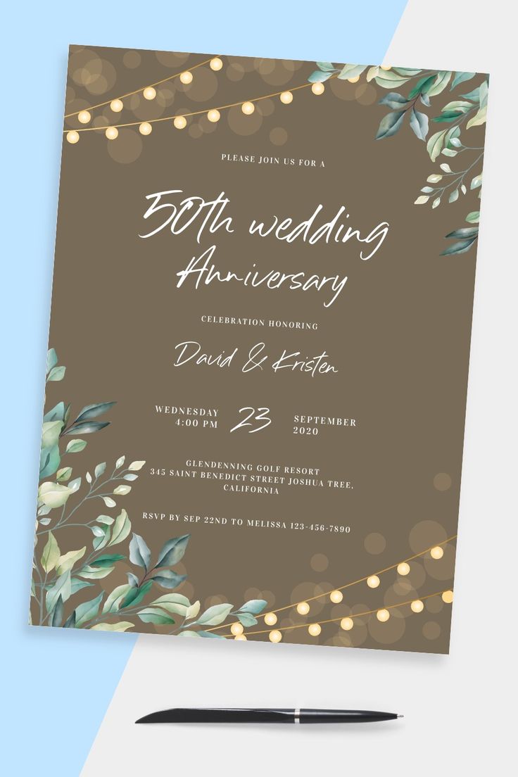 a wedding anniversary party card with lights and greenery on the front, along with a pen