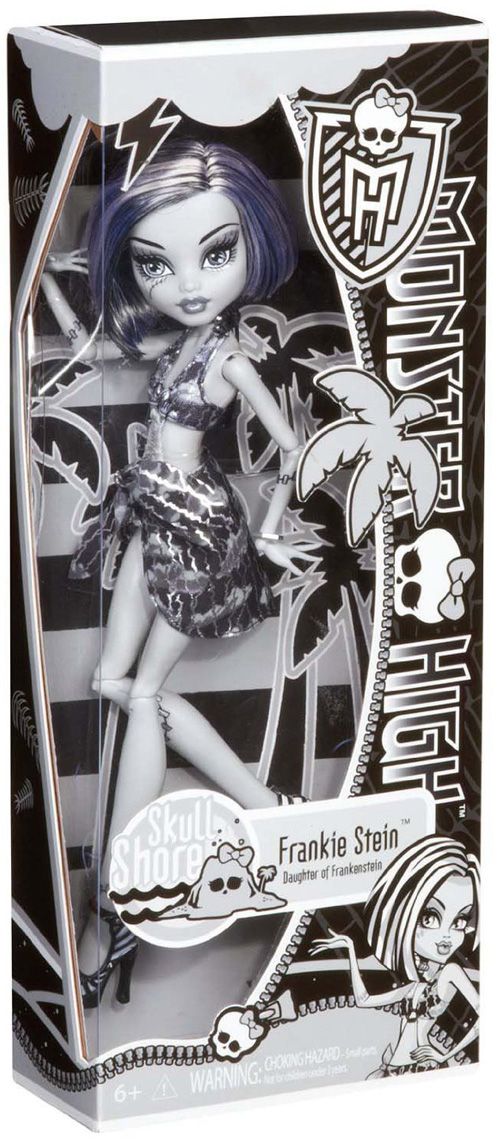 a black and white photo of a doll in a box with an advertisement on it