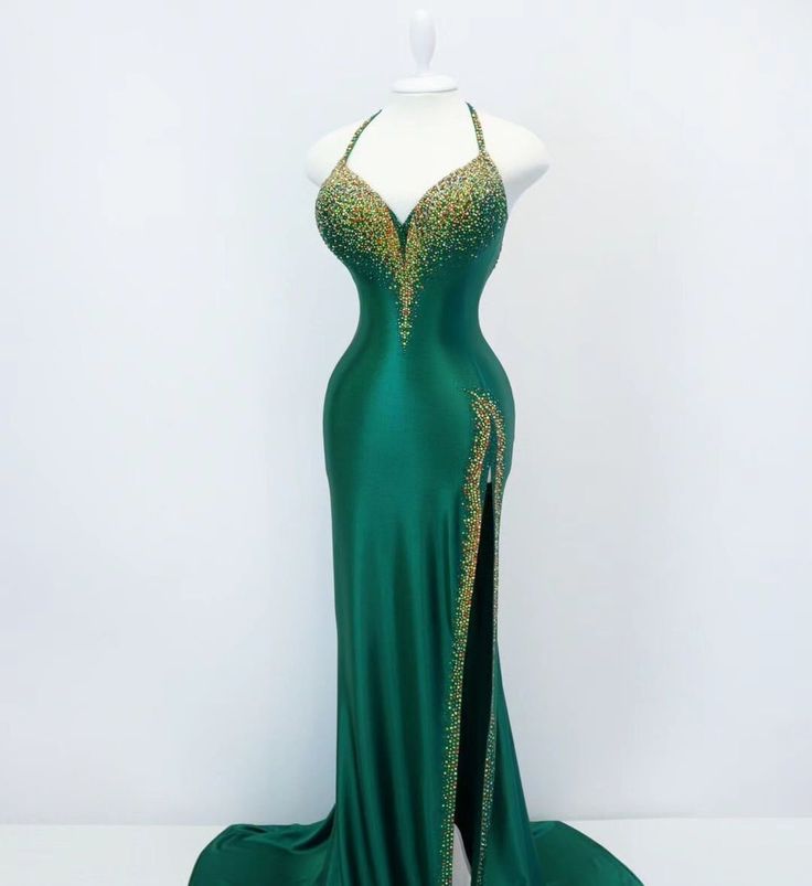 The combination of gold and green is an eternal classic. A luxurious dress made of emerald satin, a variety of golden shades and fiery highlights create a royal image. Production time excluding delivery: finished design - 4-5 weeks; custom design 2-3 months. ----------------------------------------------------- We invite you to see other offers of our store. Dark green dress, Competition Satin Dress, Dress for a fitness model, Fit-model Ready Crystal Dress, Competition Suit, IFBB Shining Dress Gold Satin Evening Dress For Gala, Gold Satin Evening Dress, Green Satin Dress For Gala, Green Satin Evening Dress With Fitted Bodice, Luxury Green Dress With Fitted Bodice, Green Satin Evening Dress For Prom, Fitted Dark Green Evening Dress For Gala, Green Satin Evening Gown, Luxury Green Formal Dress