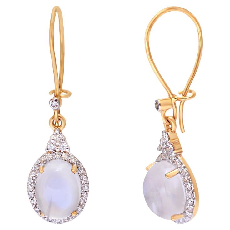 ContemporaryDrop Earrings crafted in 14K Solid Yellow Gold 0.35 Carat Natural Diamond (G-H Color, SI1 SI2 Purity) Opal Moonstone Gemstone to make your daily wear an affair to remember. Specifications Dimensions: 16*9 MM Gross Weight: 2.400 gms Gold Weight: 1.646 gms Gold Purity: 14K Yellow Gold Diamond Weight: 0.35 ctS Moonstone weight : 3.77cts SKU : FER11-SE-2594C-RMS This is a Brand new Piece . It's very hard to capture the true color and luster of the stone, I have tried to add pictures that Yellow Gold Drop Earrings With Gemstones, Yellow Gold Gemstone Diamond Drop Earrings, Oval 14k Gold Earrings With 17 Jewels, Yellow Gold Oval Diamond Earrings With Gemstone, Oval 14k Gold Earrings With Diamond Accents, Yellow Gold Halo Teardrop Earrings, Opal Moonstone, An Affair To Remember, Add Pictures