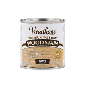 wood stain paint in an open can on a white background with the words varnahe