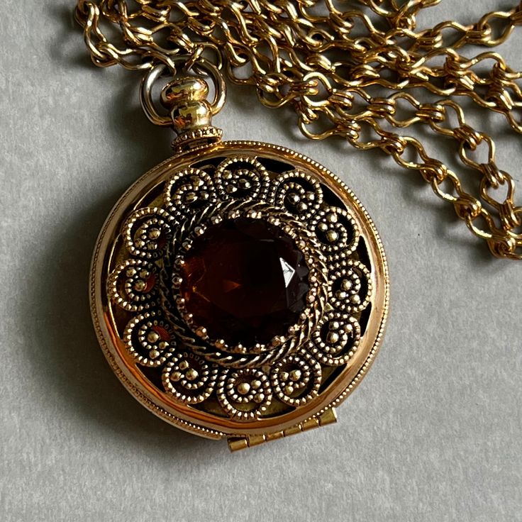 Vintage locket pendant necklace Victorian Necklace With Detachable Pendant For Gift, Vintage Medallion Necklace With Adjustable Chain For Gift, Vintage Medallion Necklace With Adjustable Chain As Gift, Elegant Bronze Round Locket Necklace, Antique Gold Filigree Locket Necklace For Formal Occasions, Vintage Medallion Locket Necklace As Gift, Victorian Pendant Locket Necklace For Formal Occasions, Ornate Pendant Locket Necklace For Keepsake, Elegant Medallion Locket Necklace With Adjustable Chain