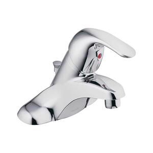 a chrome faucet with an animal head on the side and red eyes in the middle