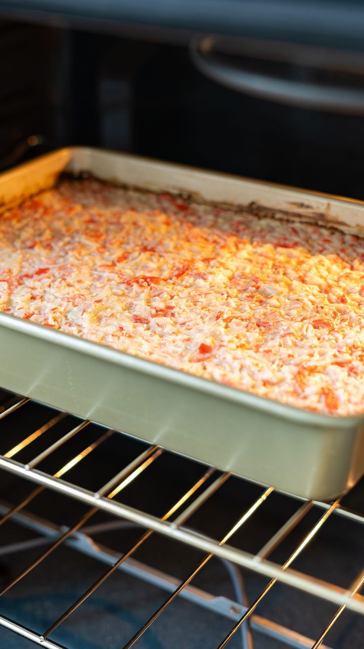 a casserole dish is baking in the oven