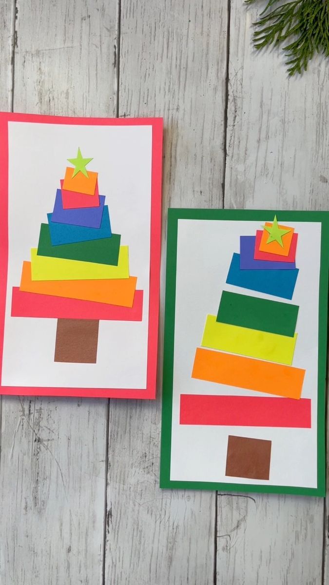 two cards with different colored paper stacked on top of each other, one has an image of a birthday cake