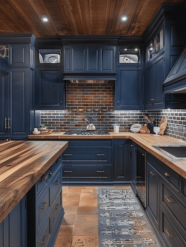 Rustic Blue Kitchen: Mixing Brown and Modern Elements Colonial Style Kitchen Cabinets, Blue Kitchen Wood Countertop, Blue Island Brown Cabinets, Rustic Kitchen Blue Cabinets, Navy Rustic Kitchen, Blue Craftsman Kitchen, Navy Blue Cabinets With Butcher Block, Blue Slate Kitchen Cabinets, Kitchen Flooring Ideas With Dark Blue Cabinets