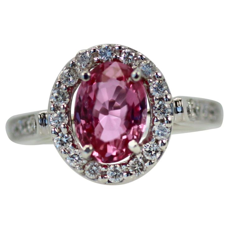 This Pink Sapphire is a gorgeous color of pink. It weighs 1.20 carats and is set with a Diamond Halo around the stone and Diamonds going down the shank, it is lovely. This is new Pink Sapphire Diamond Ring, Sapphire Solitaire Ring, Sapphire Solitaire, Sapphire And Diamond Ring, Lovely Ring, Platinum Ring, Diamond Halo, Sapphire Diamond, Pink Sapphire